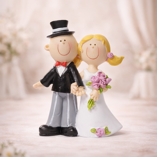 Hochzeitsfigur Brautpaar aus Polyresin 9cm mit Zylinder, Brautkleid und rosa Blumenstrauß als Tischdekoration und Geldgeschenk im Bilderrahmen